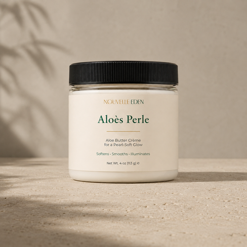 Jar of Nouvelle Eden Aloes Perle Aloe Butter Creme on a neutral background