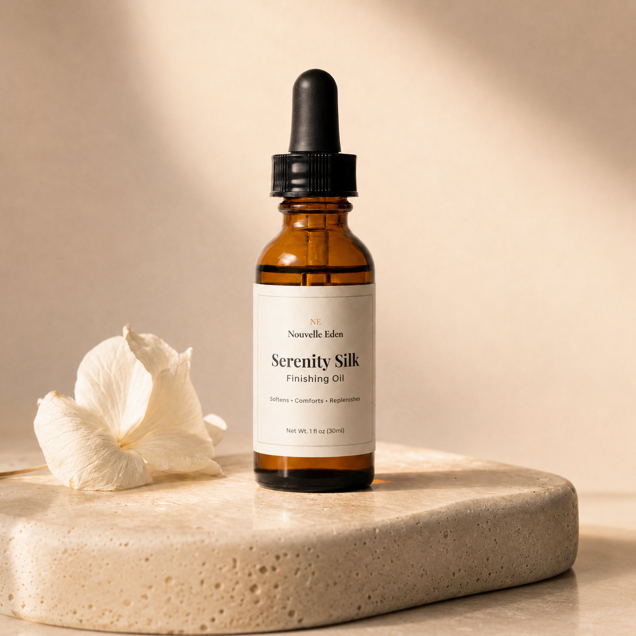 Serenity Silk finishing oil bottle with a dropper on a beige background