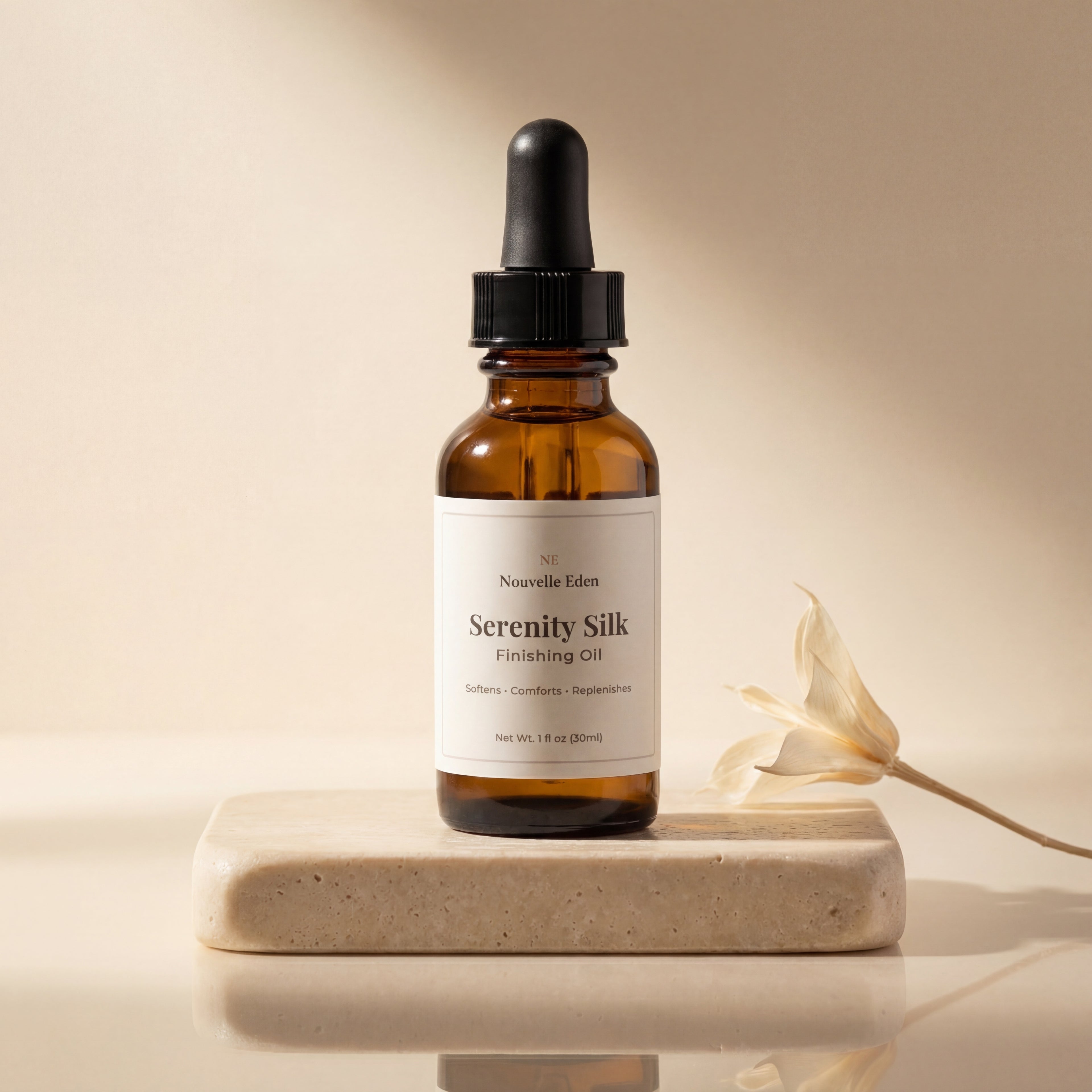 Serenity Silk finishing oil bottle on a beige background