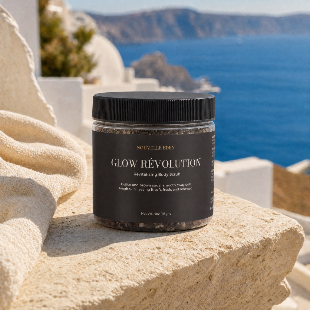 A jar of Nouvelle Eden Glow Révolution Revitalizing Body Scrub sits on a beige stone ledge with a Mediterranean-style coastal background featuring a blue sea and cliffs.